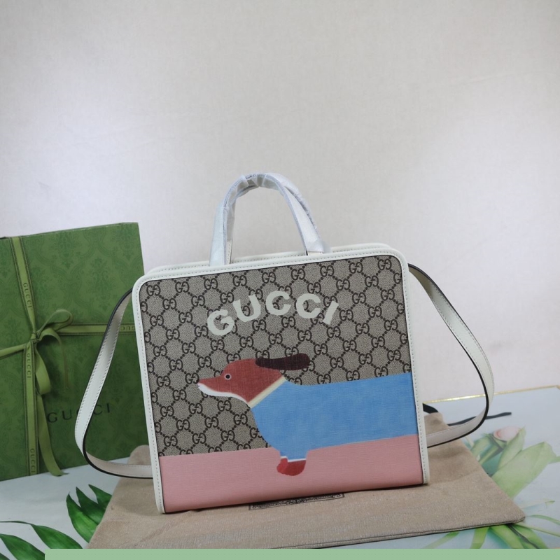 G*u*i shopping bags